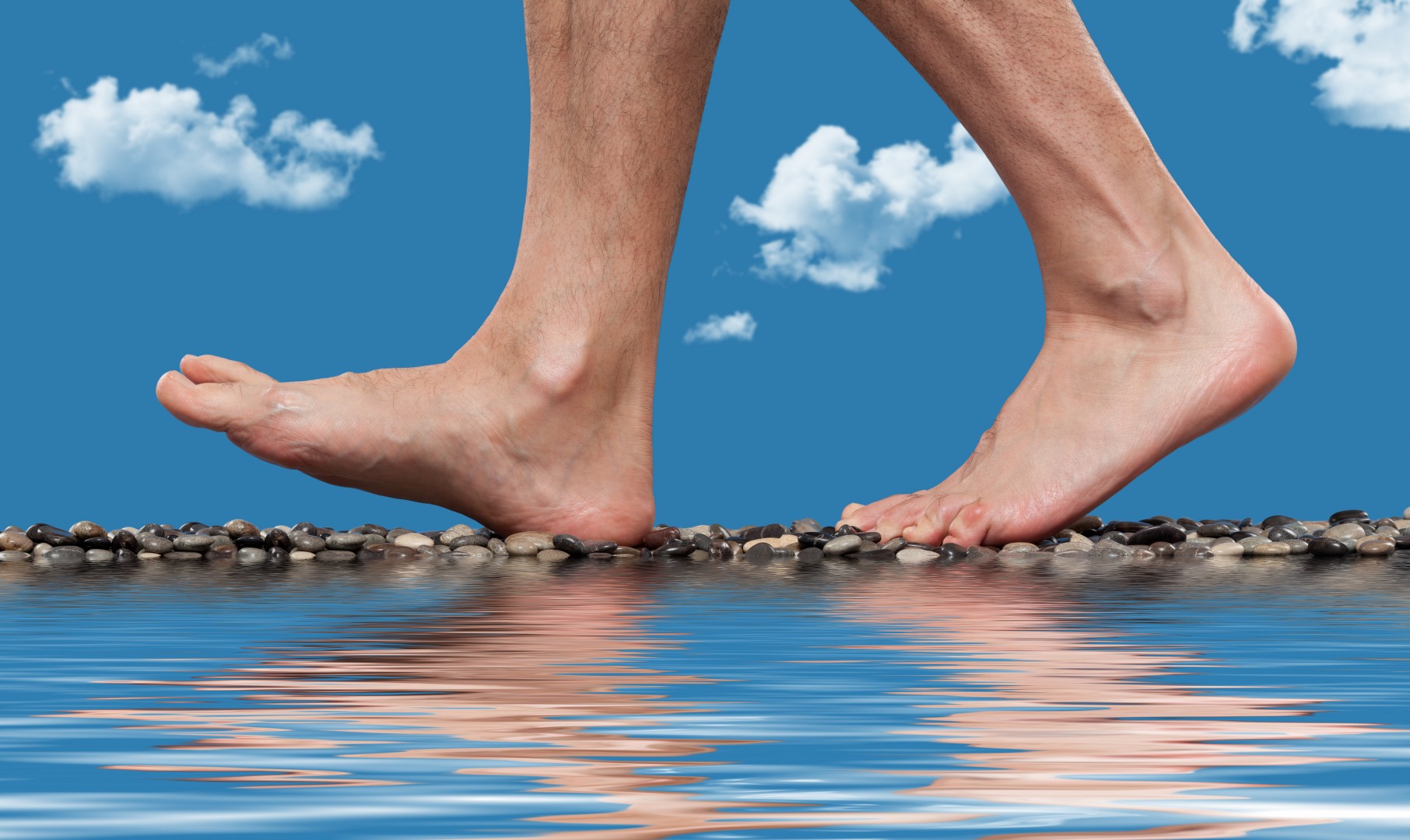 Feet walking on small stones